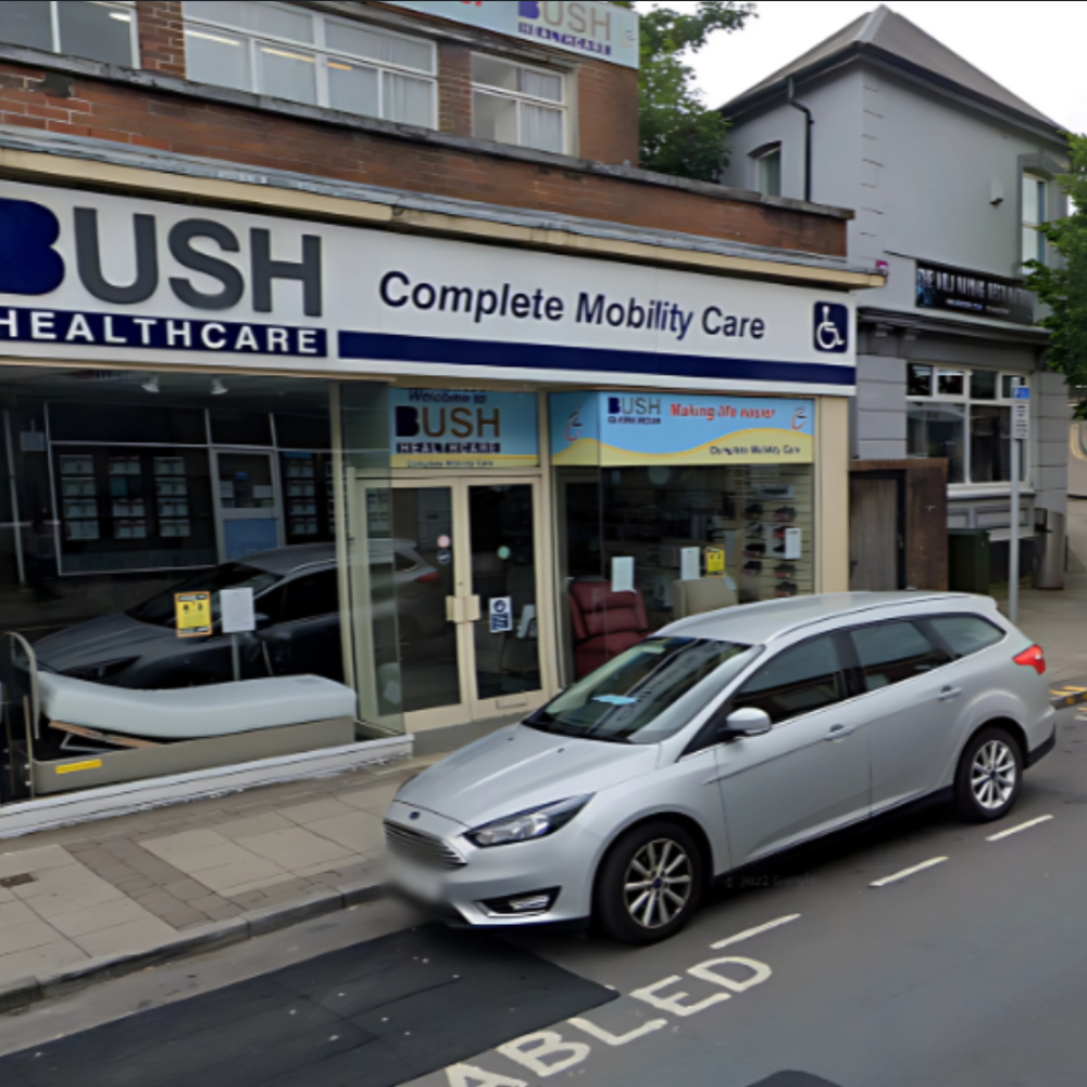 An outdoor sign for Bush Healthcare's Blackwood Mobility Showroom showing various products.