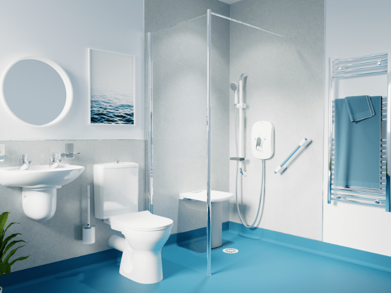 A modern, accessible bathroom with a shower area that uses a clear glass screen to allow for wheelchair and walker access, featuring an adjustable shower head and a shower chair.