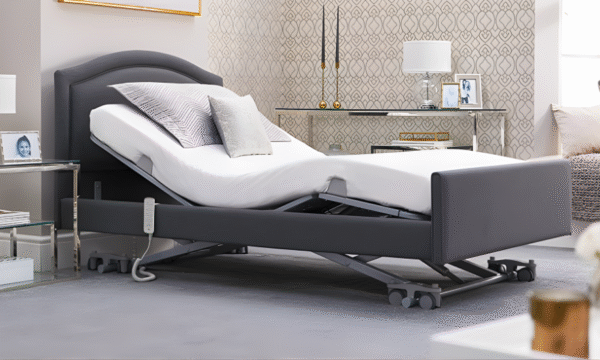 Opera Solo Comfort profiling bed in a bedroom with the head raised