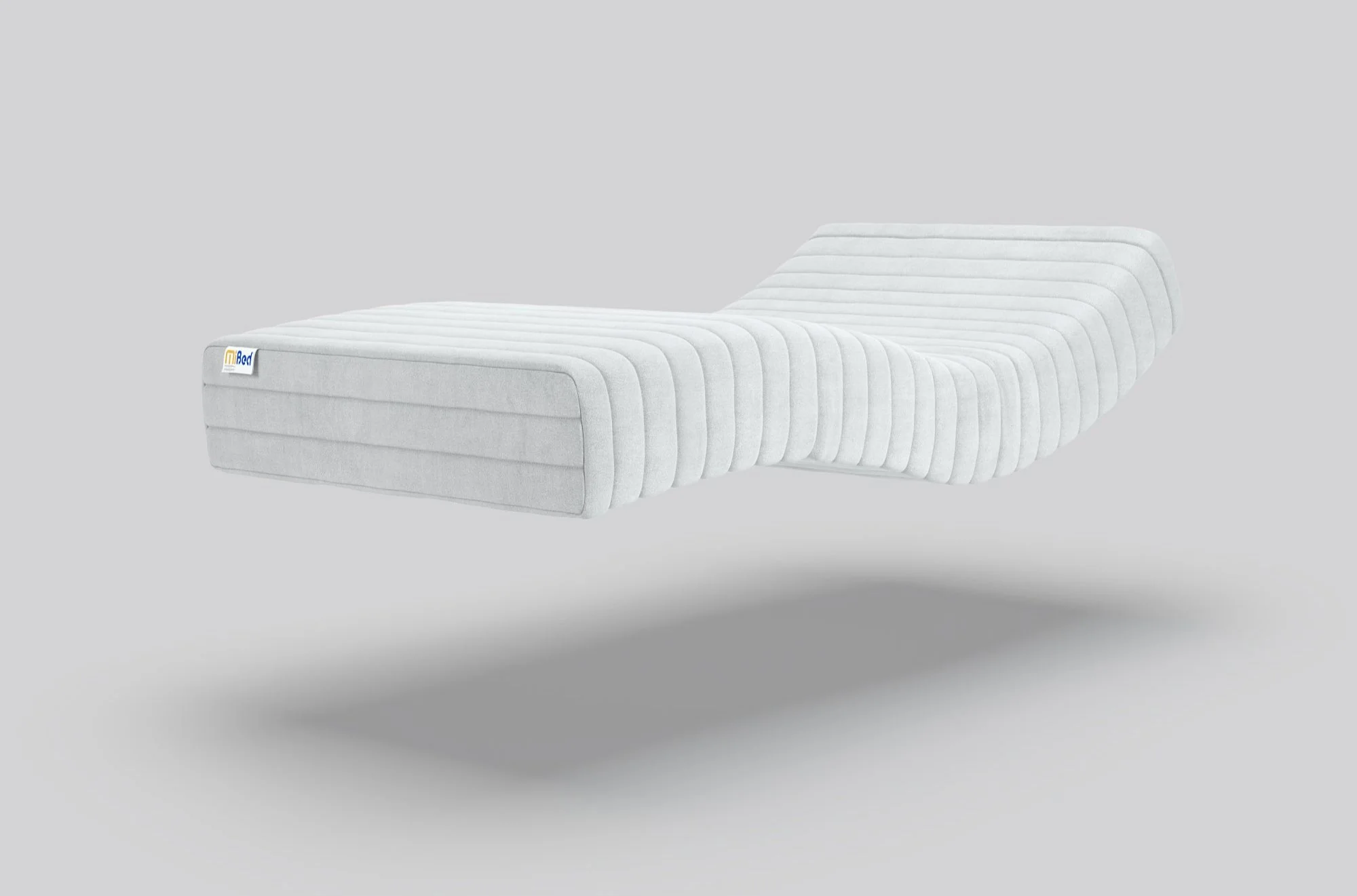 Memory foam mattress shown bending with a profiling bed